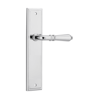 Pair of Iver Sarlat lever handles on stepped backplates, showcasing elegant brass finish and traditional design.