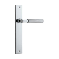 Pair of Iver Brunswick lever door handles on rectangular backplates, featuring a sleek, modern design with a polished finish.