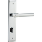 Pair of Iver Helsinki lever door handles on stepped backplate, featuring sleek modern design and polished finish.