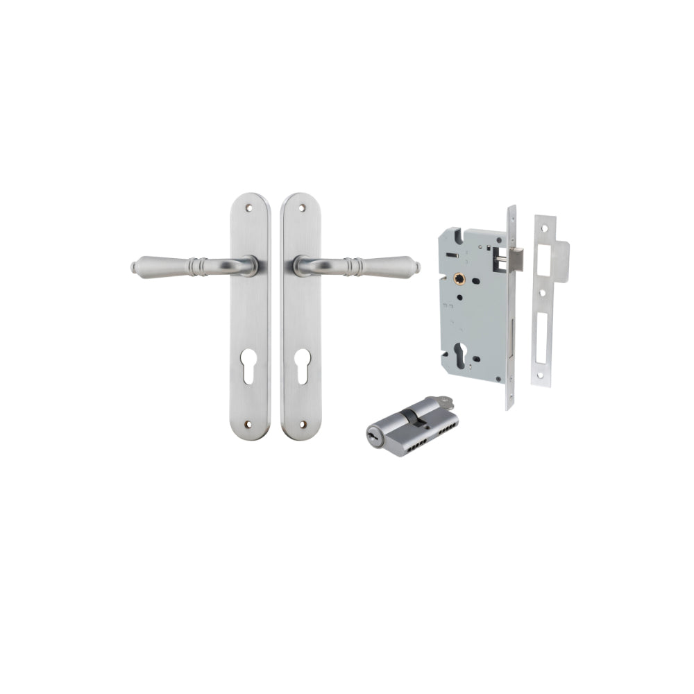 Pair of Iver Sarlat lever door handles with oval backplates, featuring a sleek, modern design on a polished finish.