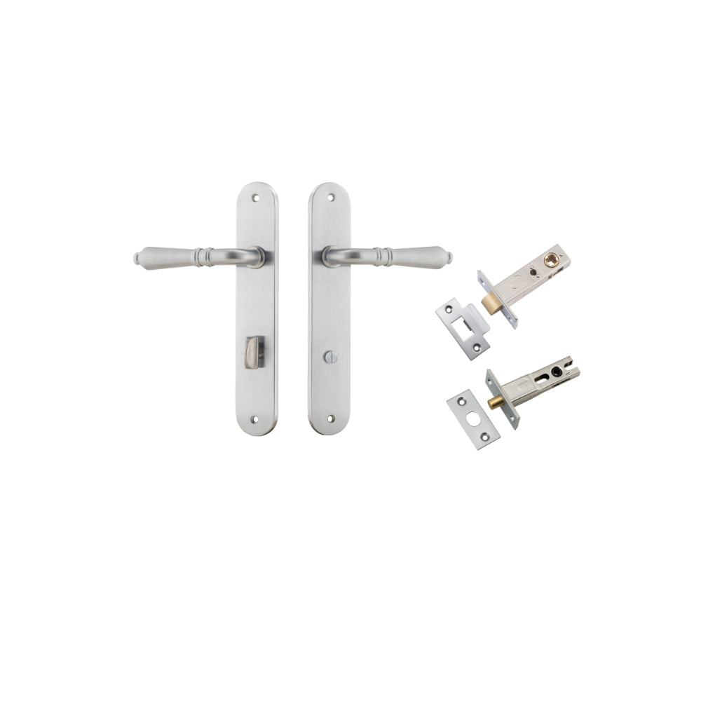 Pair of Iver Sarlat lever handles with oval backplates, featuring a sleek, modern design on a polished finish.