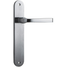 Pair of Iver Annecy lever door handles on oval backplates, featuring a sleek, modern design in polished finish.