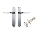 Pair of Iver Annecy lever door handles on oval backplates, featuring a sleek, modern design in a polished finish.