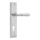 Pair of Iver Sarlat lever handles on stepped backplate, showcasing elegant door hardware with a polished finish.