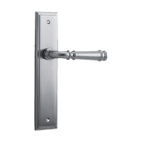 Pair of Iver Verona lever door handles on stepped backplates, showcasing elegant architectural hardware design.