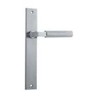 Pair of Iver Brunswick lever door handles on rectangular backplates, featuring a sleek, modern design in a polished finish.