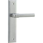 Pair of Iver Helsinki lever door handles on stepped backplates, featuring sleek modern design in a polished finish.