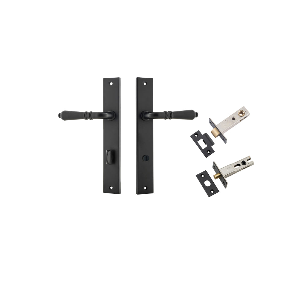Pair of Iver Sarlat lever handles with rectangular backplates, showcasing polished brass finish and modern, sleek design.