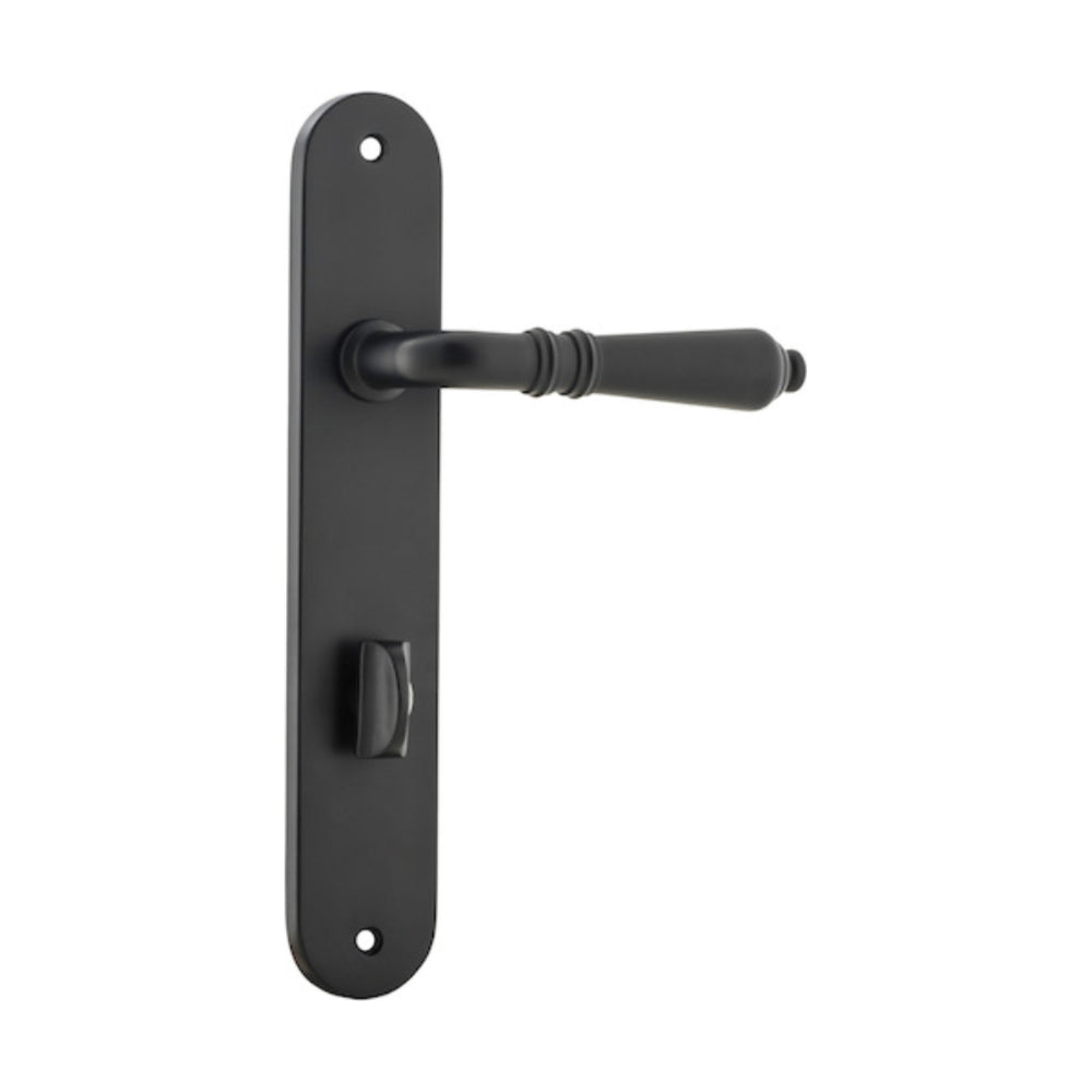Pair of Iver Sarlat lever handles with oval backplates, featuring a sleek, modern design for interior doors.