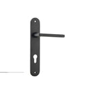 Pair of Iver Baltimore lever door handles on oval backplates, featuring a sleek, modern design with a polished finish.