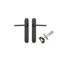 Pair of Iver Baltimore lever door handles on oval backplates, featuring a sleek, modern design in a polished finish.
