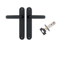 Pair of Iver Bronte lever door handles on oval backplates, featuring a sleek, modern design in a polished finish.