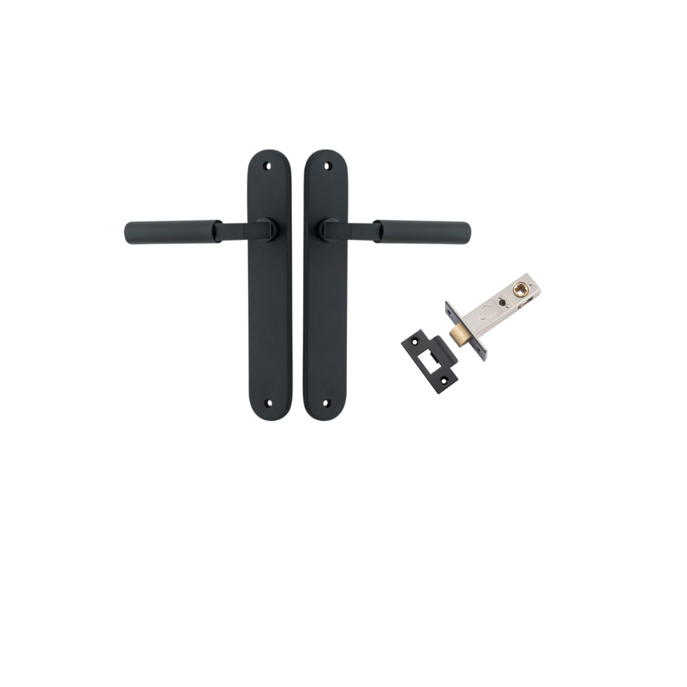 Pair of Iver Berlin lever door handles with oval backplates in a sleek, modern design, shown in a close-up view.