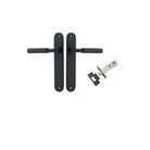 Pair of Iver Berlin lever door handles with oval backplates in a sleek, modern design, shown in a close-up view.
