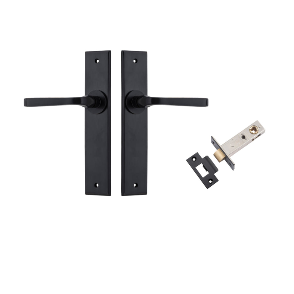 Pair of Iver Annecy lever door handles on chamfered backplates, featuring sleek, modern design for stylish interior doors.
