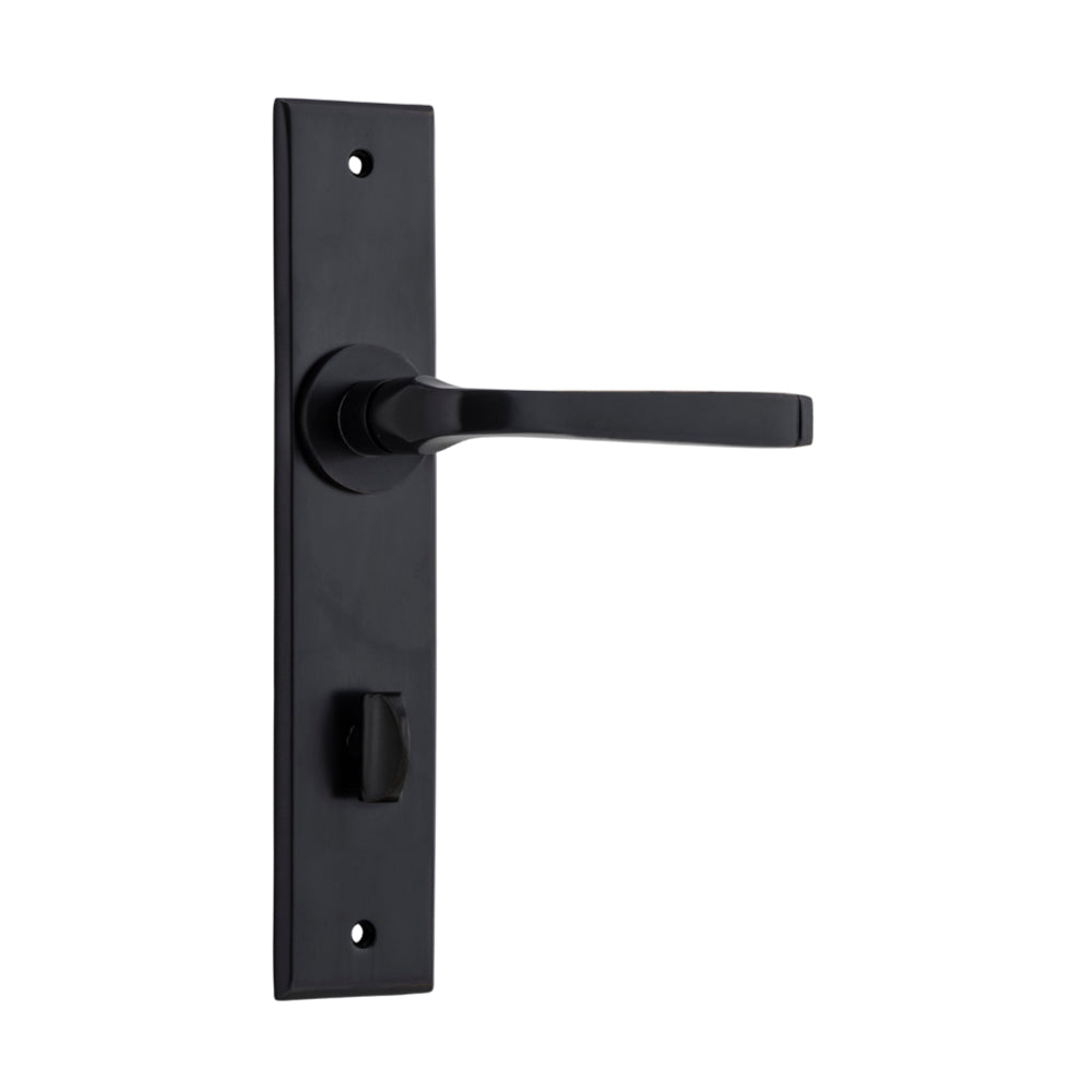 Pair of Iver Annecy lever door handles with chamfered backplates, showcasing elegant metal finish and detailed design.