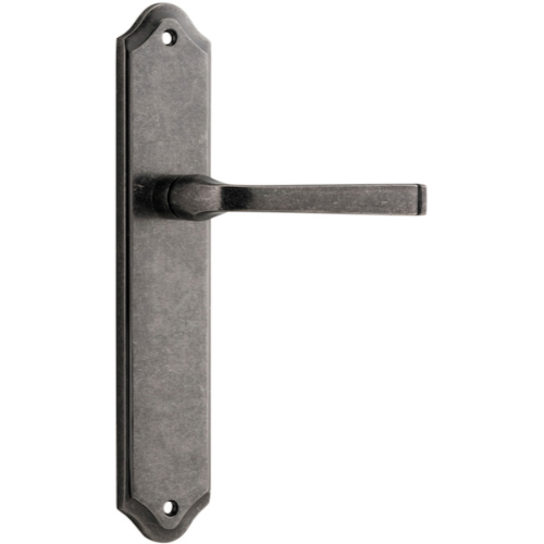 Pair of Iver Annecy lever handles on shouldered backplates, featuring a sleek, modern brass finish for door hardware.