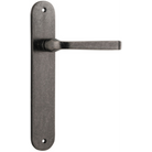 Pair of Iver Annecy lever handles on oval backplates, featuring elegant brass finish and modern design for stylish door hardware.