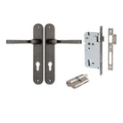 Pair of Iver Annecy lever handles on oval backplates, featuring sleek metallic finish and modern design for interior doors.