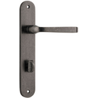 Pair of Iver Annecy lever handles on oval backplates, featuring polished metal finish and elegant design for interior doors.