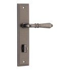 Pair of Iver Sarlat lever handles on stepped backplates, showcasing elegant door hardware with a polished finish.