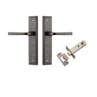 Pair of Iver Annecy lever door handles with stepped backplate, showing polished brass finish and elegant design.