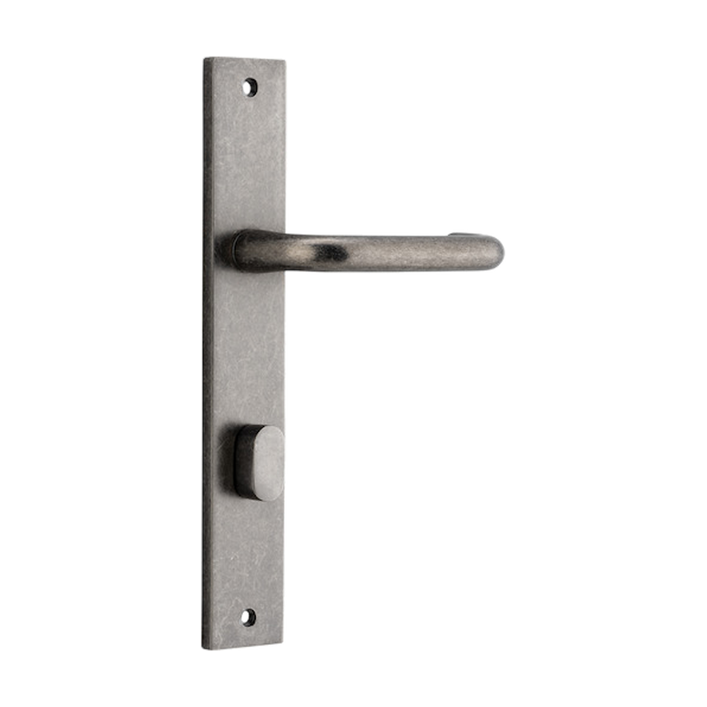 Pair of Iver Oslo lever handles on rectangular backplates, architectural hardware for doors, with a sleek, modern design.