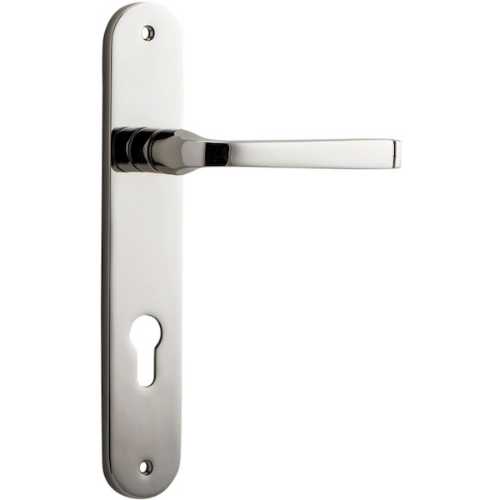 Pair of Iver Annecy lever door handles with oval backplates, featuring sleek modern design and polished finish.