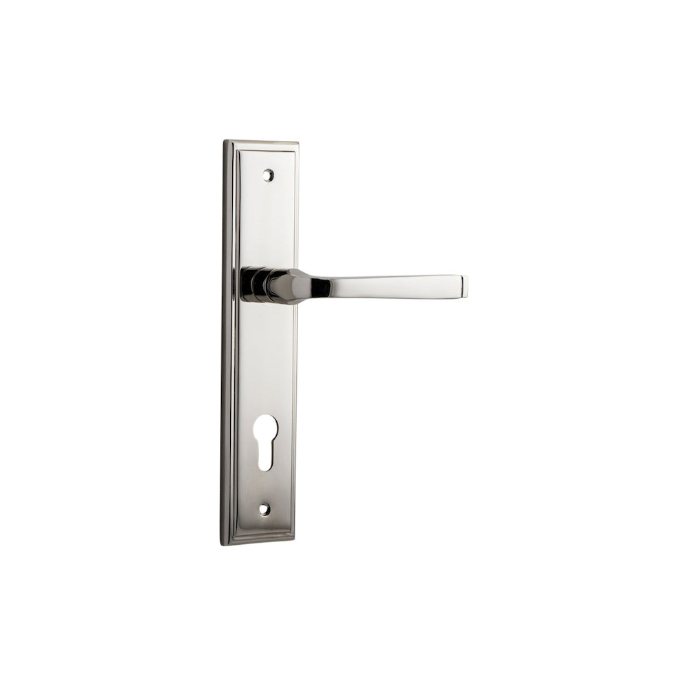 Pair of Iver Annecy lever handles on stepped backplates, showcasing elegant brushed metal finish and detailed design.