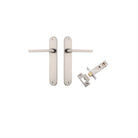 Pair of Iver Baltimore lever door handles on oval backplates, featuring sleek metal finish and modern design.