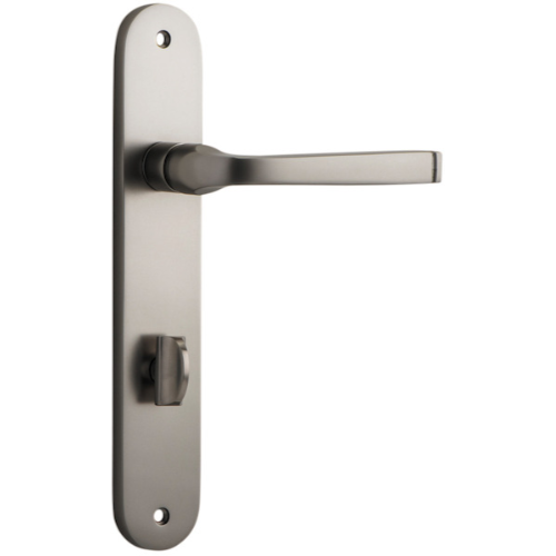 Pair of Iver Annecy lever door handles on oval backplates, featuring a sleek modern design in polished metal finish.