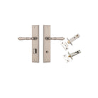 Pair of Iver Sarlat lever handles on stepped backplates, showcasing elegant hardware for doors with a polished finish.