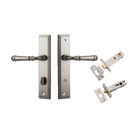 Pair of Iver Verona architectural hardware lever handles on stepped backplates, shown in a polished metal finish.