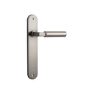 Pair of Iver Berlin lever door handles on oval backplates, showcasing sleek metal design and polished finish.