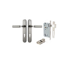 Pair of Iver Berlin lever door handles on oval backplates in a polished finish, mounted on a door.