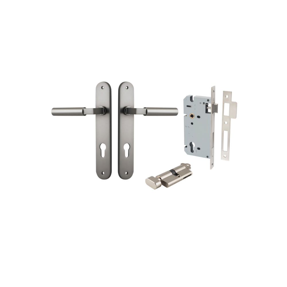 Pair of Iver Berlin lever door handles on oval backplates, featuring sleek, modern chrome finish and ergonomic design.