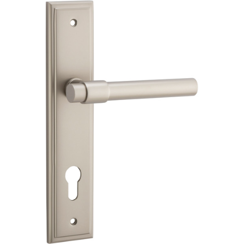 Pair of Iver Helsinki lever door handles on stepped backplate, featuring modern chrome finish and sleek design.