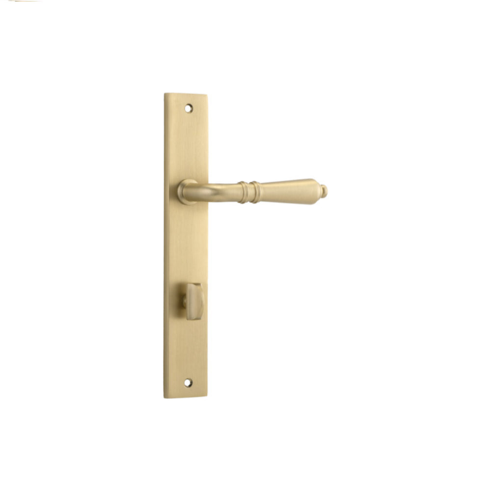 Pair of Iver Sarlat lever handles on rectangular backplates, showcasing polished brass finish and classic door hardware design.