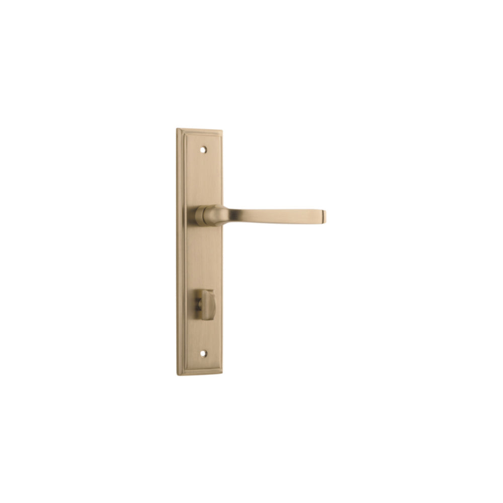 Pair of Iver Annecy lever handles on stepped backplates, featuring elegant brass finish and modern design for interior doors.