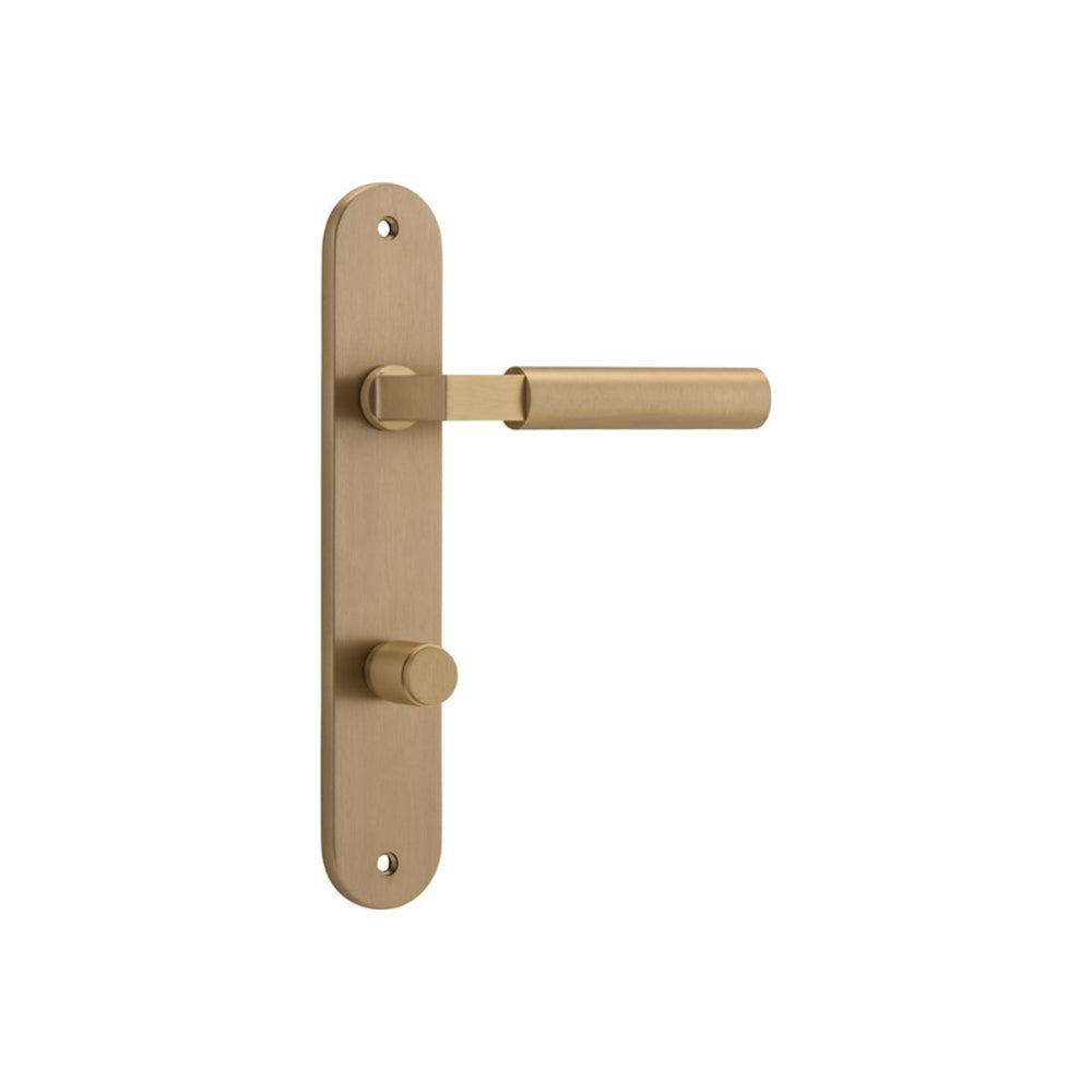 Pair of Iver Berlin lever door handles on oval backplates, showcasing sleek modern design with polished finish.