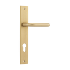Pair of Iver Oslo lever handles on rectangular backplates, architectural hardware for doors, shown in a close-up view.