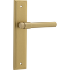 Pair of Iver Helsinki lever door handles on stepped backplates, showcasing sleek modern design in a close-up view.