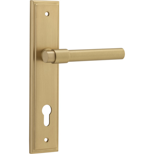 Pair of Iver Helsinki lever door handles with stepped backplates, showcasing sleek, modern design in a close-up view.