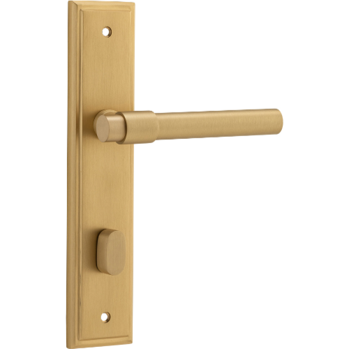 Pair of Iver Helsinki lever door handles on stepped backplates, showcasing sleek, modern design in polished finish.