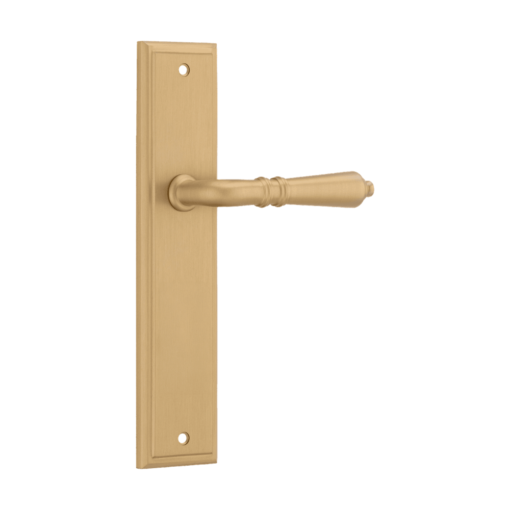 Pair of Iver Sarlat lever door handles on stepped backplate, featuring a modern metal design for stylish entryway decor.