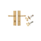 Pair of Iver Sarlat lever handles with stepped backplate, showcasing elegant brass finish and detailed design for interior doors.