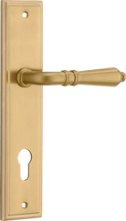 Pair of Iver Sarlat lever door handles on stepped backplate, showcasing elegant metal hardware with a polished finish.