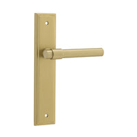 Pair of Iver Helsinki lever door handles with stepped backplate, showcasing sleek metal finish and modern design.
