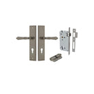 Pair of Iver Sarlat lever door handles with stepped backplate, shown in a polished finish on a modern door.
