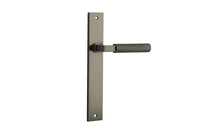 Pair of Iver Brunswick door levers with rectangular backplates, featuring sleek, modern design and polished metal finish.